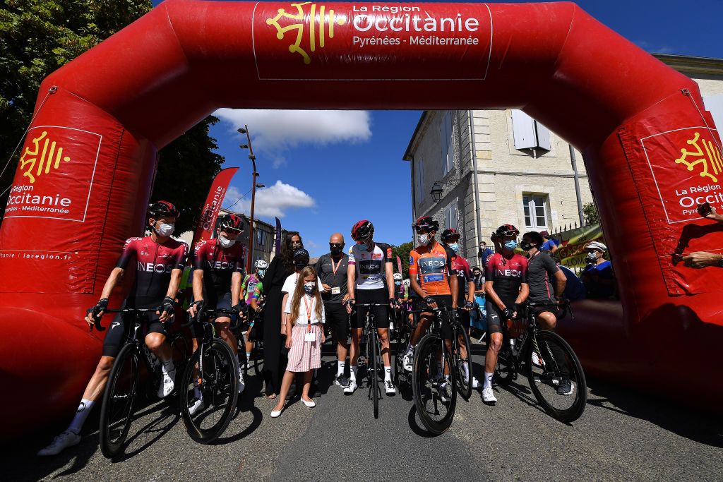 ROCAMADOUR FRANCE AUGUST 04 Start Tribute to Nicolas Portal of France Team Ineos former Sports Director Dylan Van Baarle of The Netherlands and Team Ineos Tao Geoghegan Hart of The United Kingdom and Team Ineos Magalie Portal Wife and his two children Lenny and Anhoa Dave Brailsford of The United Kingdom Team Ineos General Team Manager Pavel Sivakov of Russia and Team Ineos White Best Young Rider Jersey Egan Bernal of Colombia and Team Ineos Orange Leader Jersey Christopher Froome of The United Kingdom and Team Ineos Lectoure Village Mask Covid Safety Measures during the 44th La Route dOccitanie La Depeche du Midi 2020 Stage 4 a 195km stage from Lectoure to RocamadourCauvaldorLot 295m RouteOccitanie RDO2020 on August 04 2020 in Rocamadour France Photo by Justin SetterfieldGetty Images