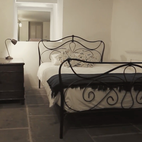 bed with bedside table