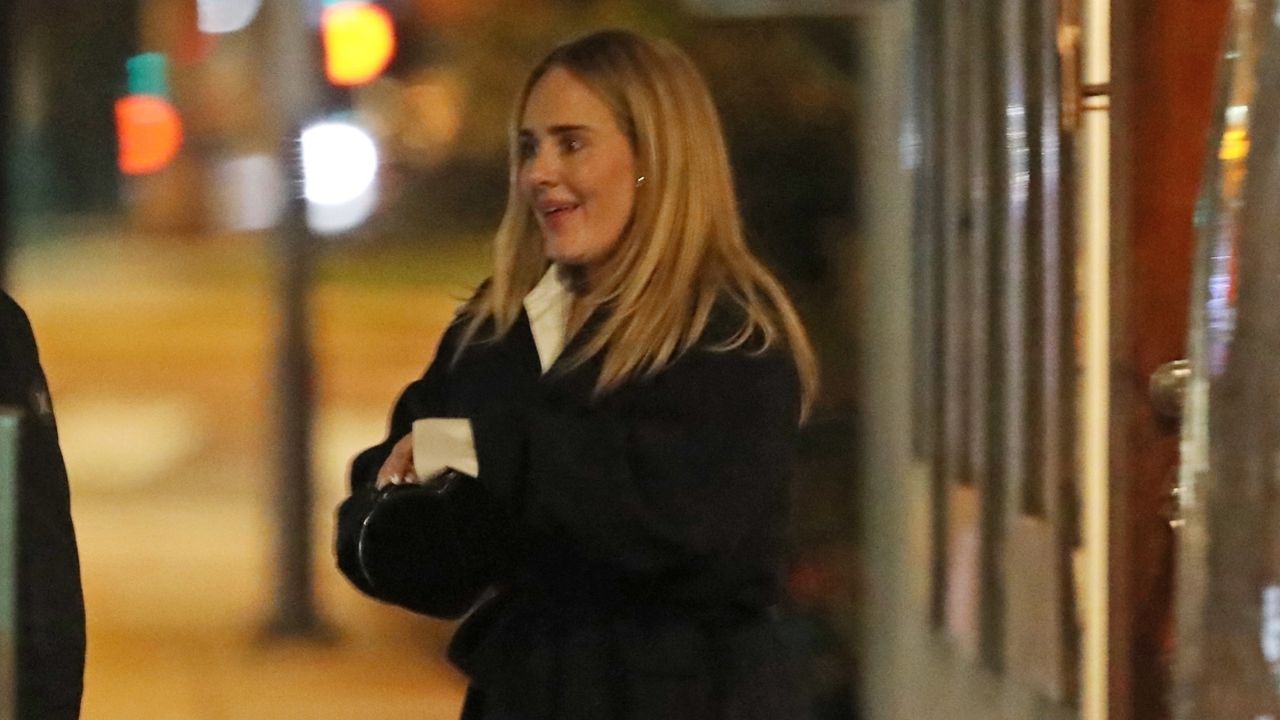 Adele on a late night date with a heart shaped bag