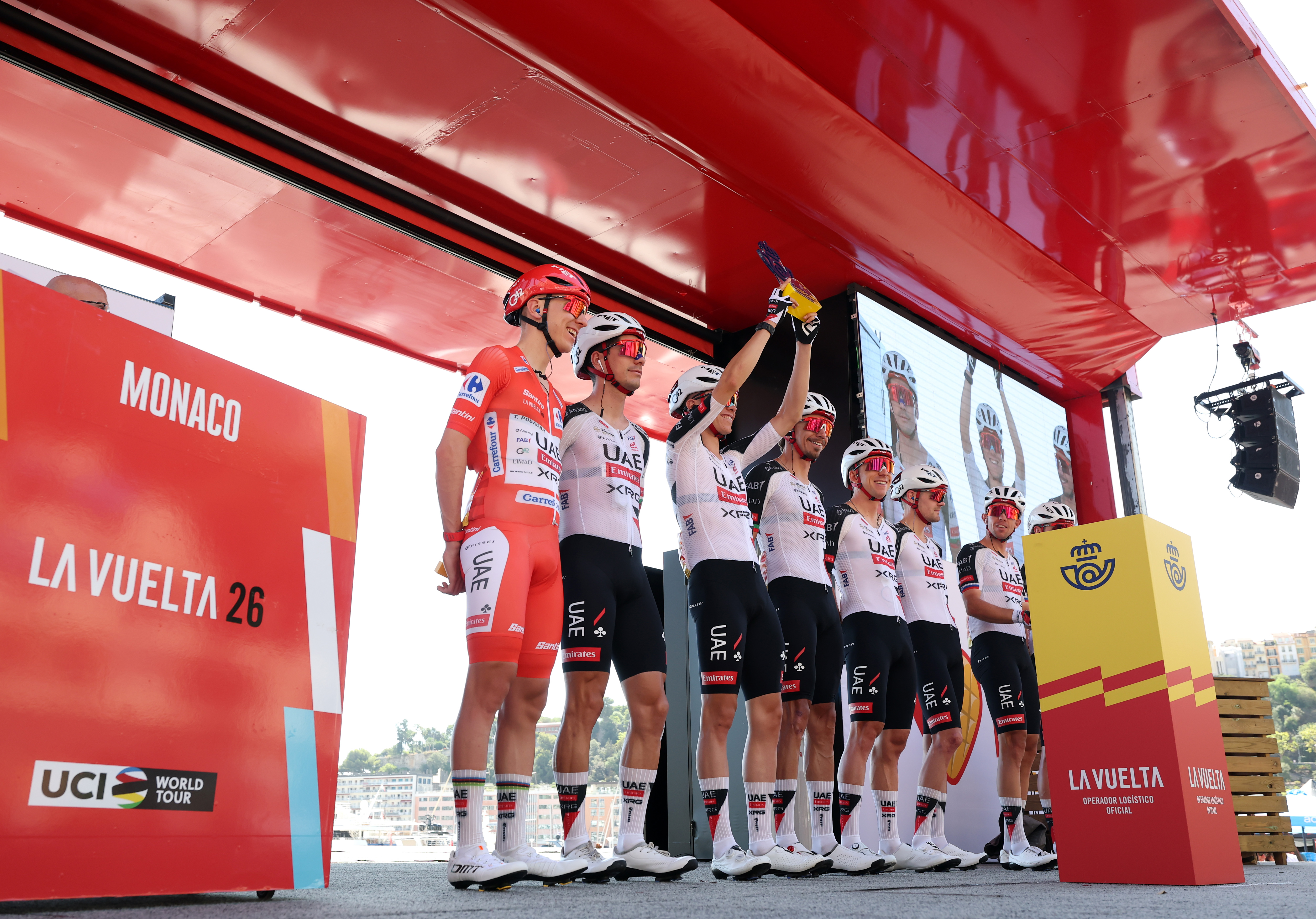 MONACO - AUGUST 23: A general view of Tadej Pogacar of Slovenia - Red Leader Jersey, Joao Almeida of Portugal, Domen Novak of Slovenia, Ivo Oliveira of Portugal, Pavel Sivakov of France, Pablo Torres of Spain, Kevin Vermaerke of United States, Jay Vine of Australia and UAE Team Emirates XRG prior to the La Vuelta - 81st Tour of Spain 2026, Stage 2 a 214.3km from Monaco to Manosque 408m / #UCIWT / on August 23, 2026 in Monaco, Monaco. (Photo by Alexander Hassenstein/Getty Images)