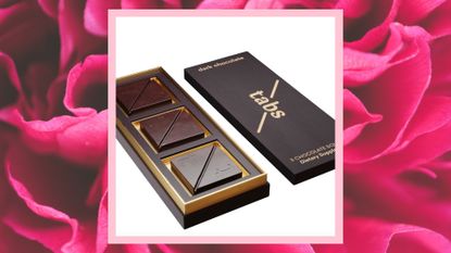 sex chocolate tabs box on pink floral background