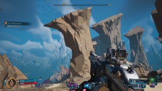 Borderlands 4 review screenshot showing cliffs towering beneath blue skies