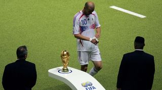 Zinedine Zidane walks past the World Cup trophy following his red card in France's World Cup final loss to Italy in 2006.