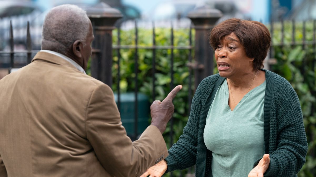 Yolande Trueman cries as she tries to stop Patrick Trueman from confronting Pastor Clayton.