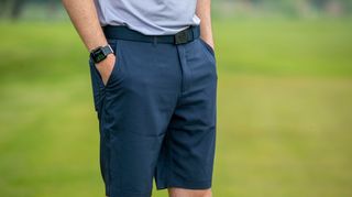 Man wearing the Galvin Green Percy Shorts on the golf course