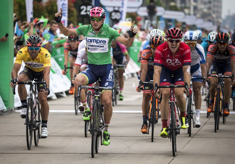 Sacha Modolo sits up and enjoys his victory
