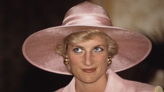 diana, princess of wales 1961 1997 visits a school for the deaf and dumb in yaoundé, cameroon, march 1990 she is wearing a pink and yellow suit by catherine walker and a philip somerville hat photo by jayne fincherprincess diana archivegetty images