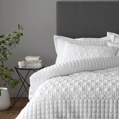 dunelm billie bedding on a grey bed in a grey bedroom