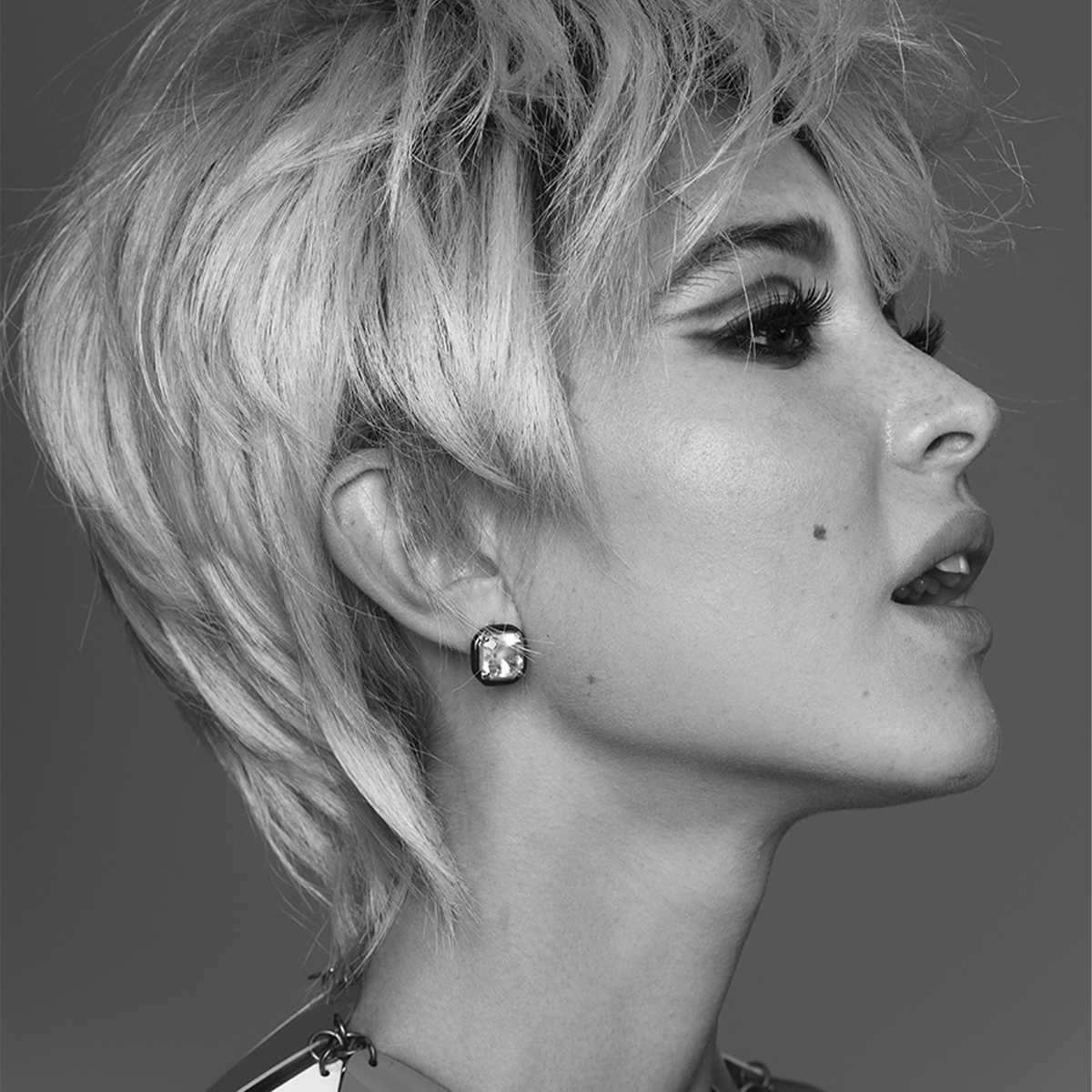 Black and white profile portrait of actress Isabel May shot by Elias Tahan. 