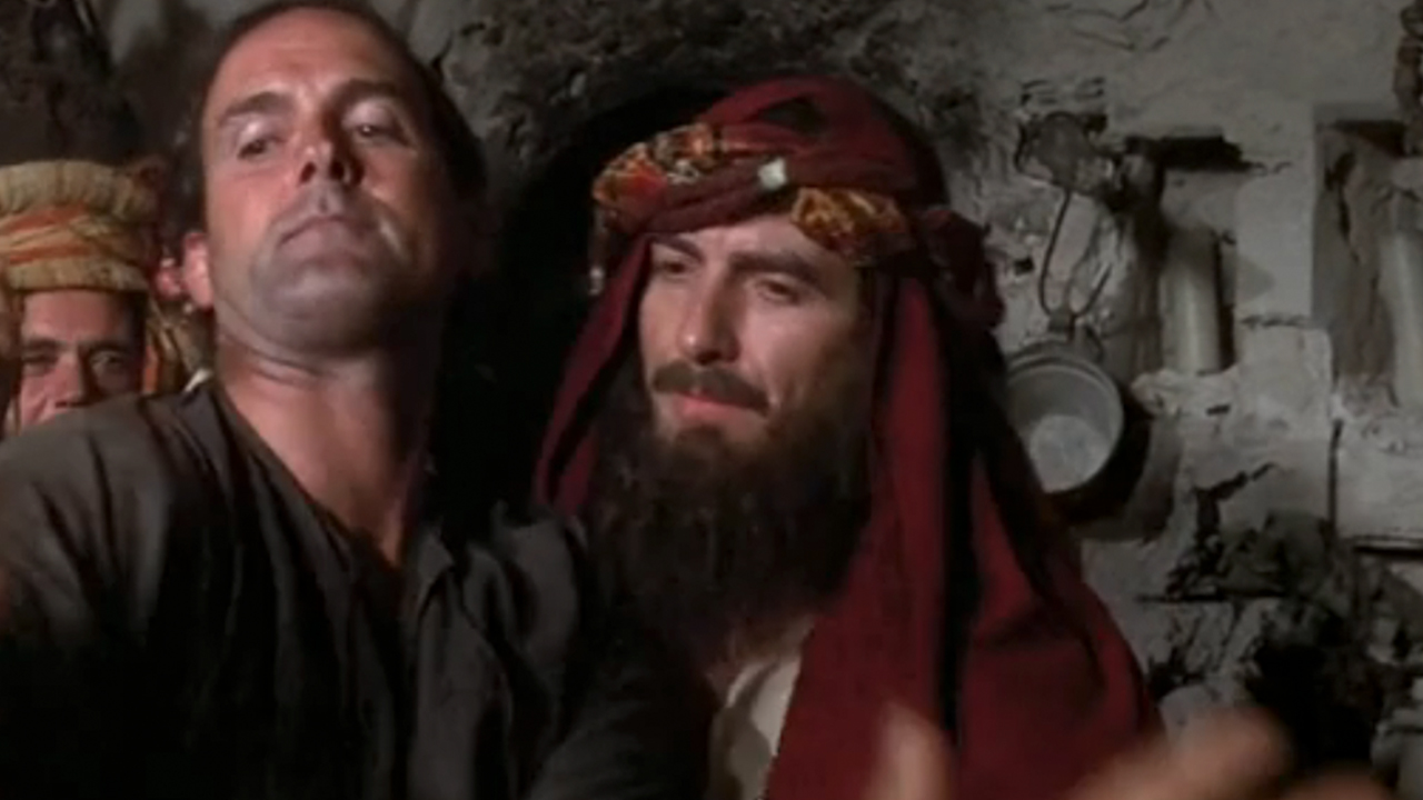 John Cleese and George Harrison in Monthy Python's Life of Brian
