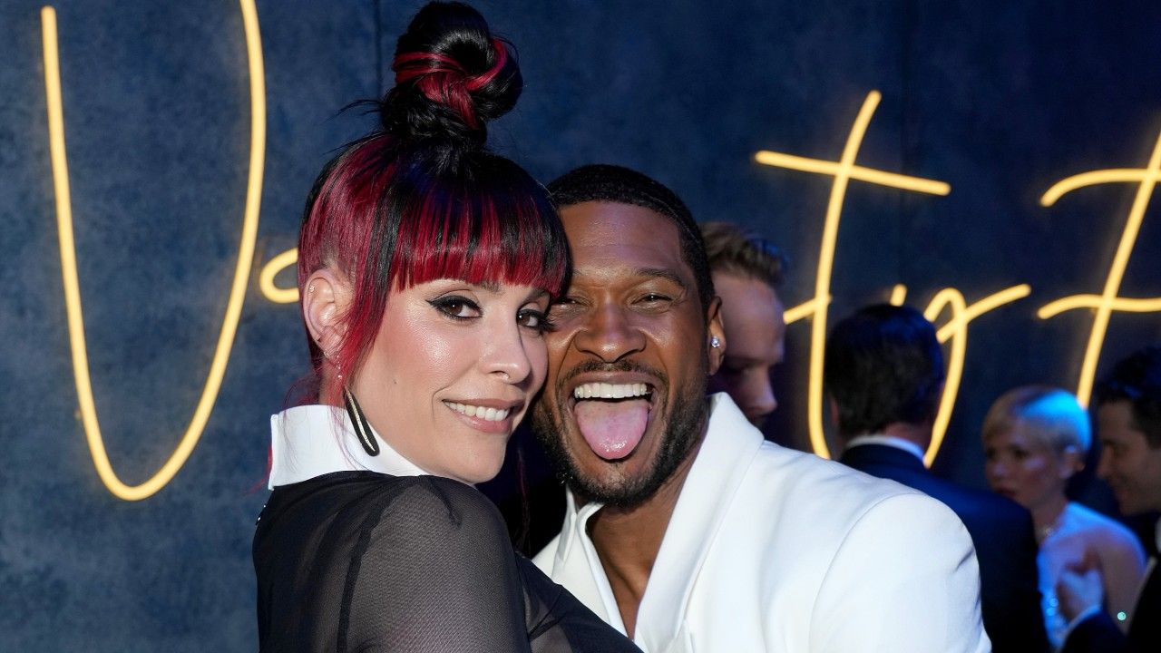 Usher and his girlfriend