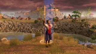 Lady with spear strikes a pose.