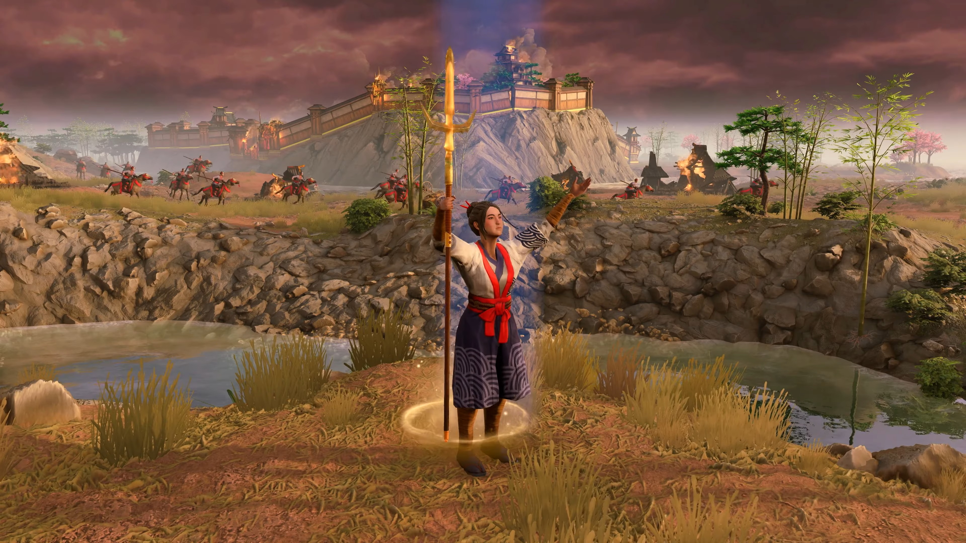 Lady with spear strikes a pose.