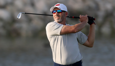 Sergio Garcia hits an iron from the fairway