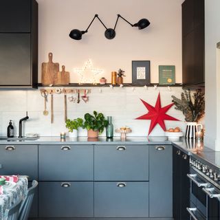 grey kitchen cabinets with red star on top