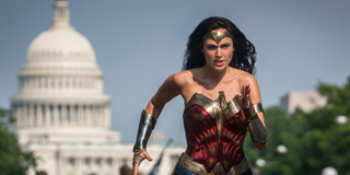 Wonder Woman running in front of the Washington capitol DC
