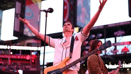 Tyson Ritter of The All-American Rejects performs after the game between the Atlanta Braves and the Arizona Diamondbacks at Chase Field on April 04, 2026 in Phoenix, Arizona. The Diamondbacks defeated the Braves 2-1. 