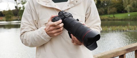Canon RF 24-105mm f/2.8 IS USM Z lens on a Canon EOS R5 camera held in hands