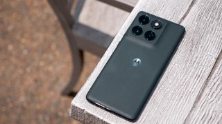 The vegan leather back of the forest green Motorola Edge 2025