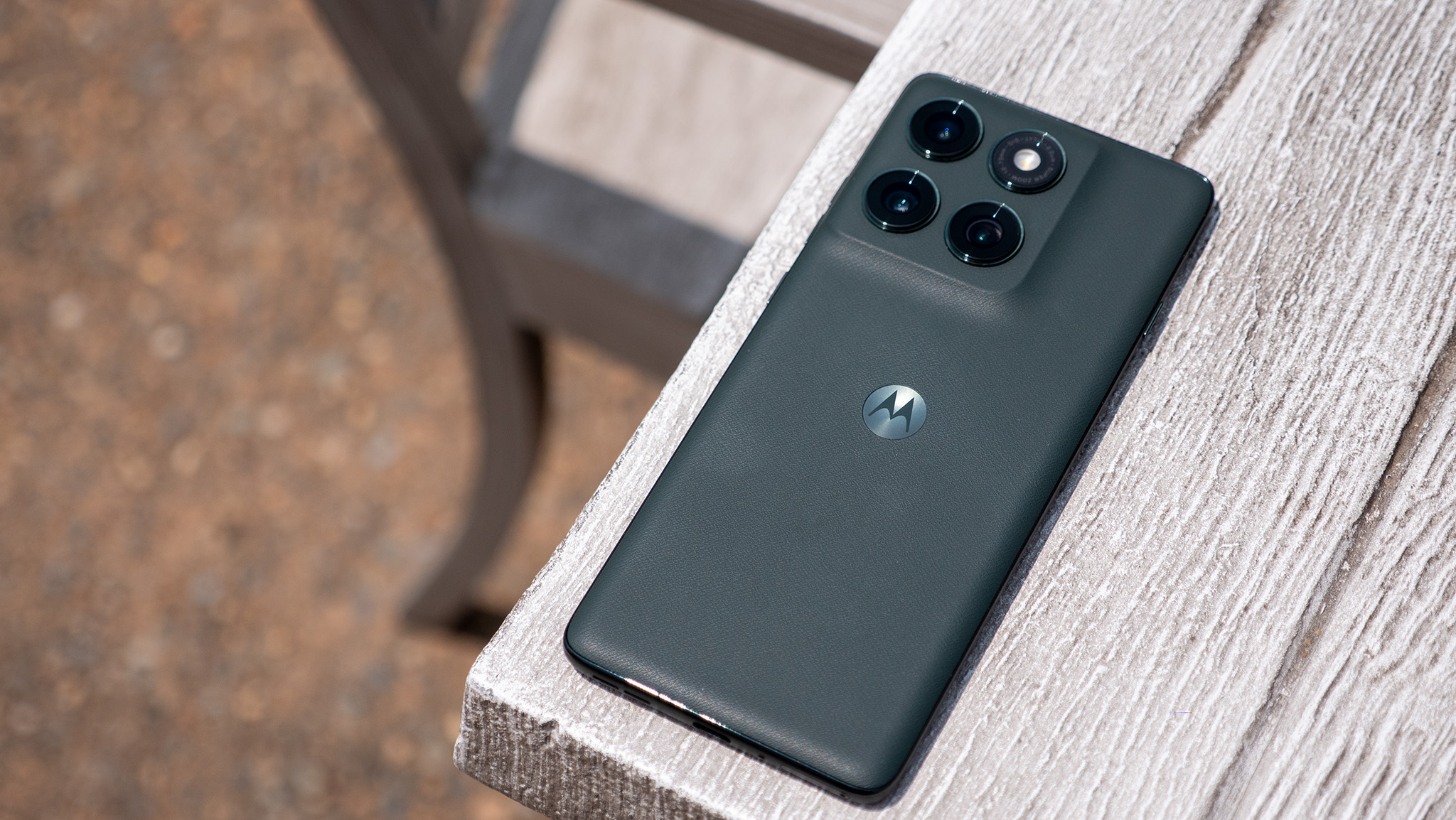 The vegan leather back of the forest green Motorola Edge 2025 