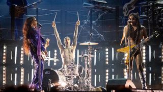 H.E.R., Travis Barker and Lenny Kravitz perform at the 2022 Grammy Awards