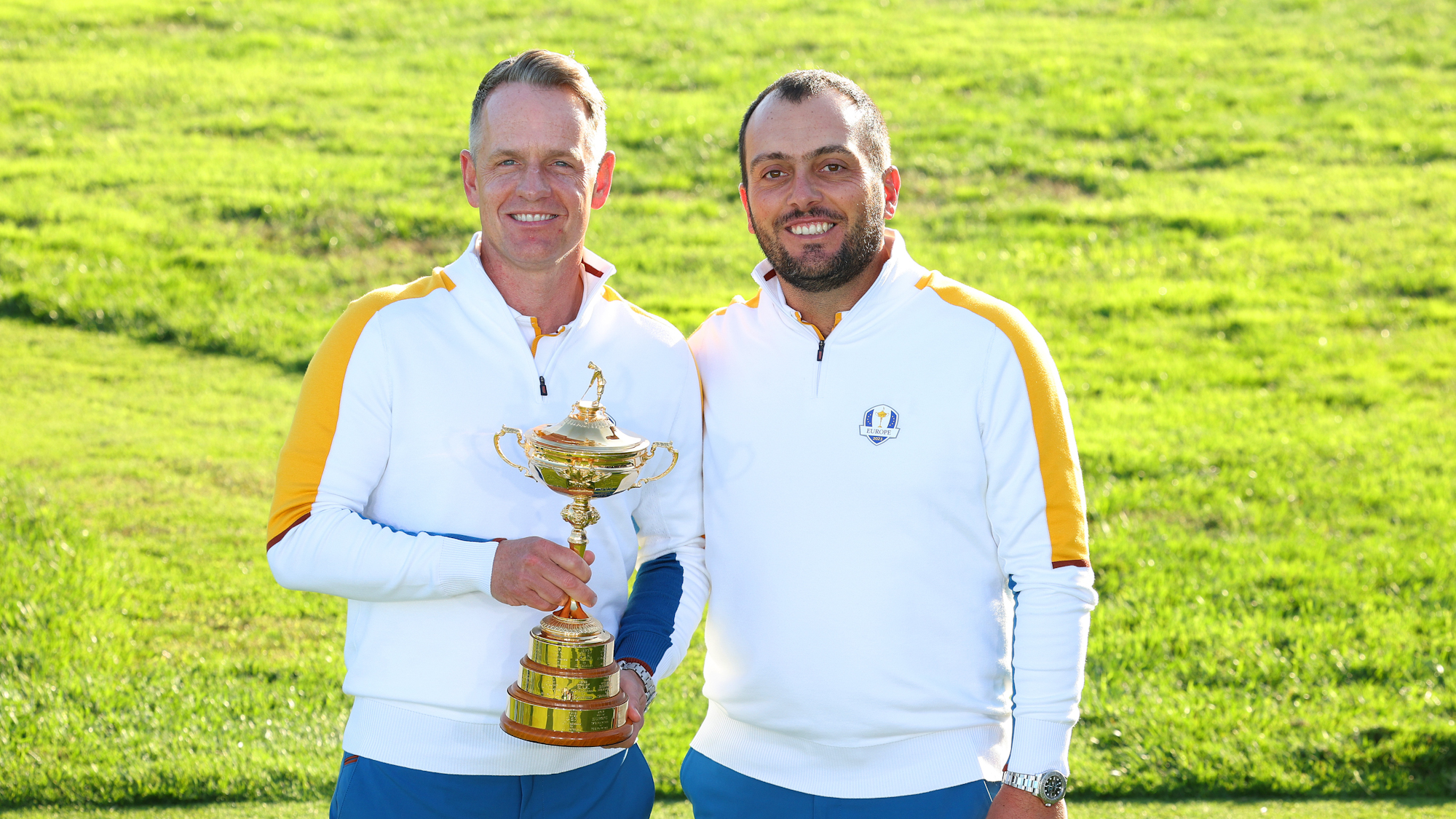 Luke Donald, Captain of Team Europe and Francesco Molinari, Vice Captain of Team Europe pose with the Ryder Cup trophy during the European Team Portraits at the 2023 Ryder Cup.