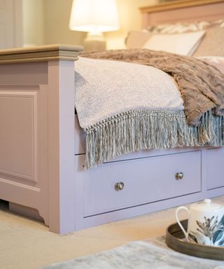 pink bed with drawers