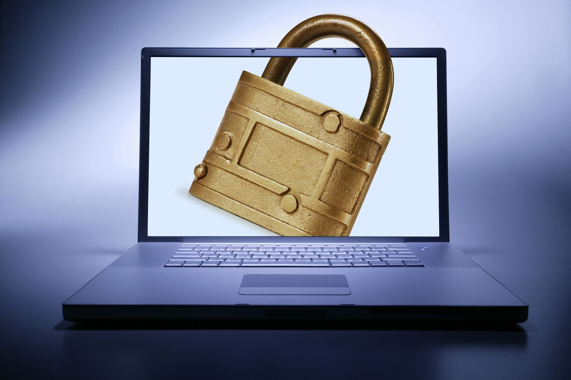 Internet Security. Open laptop with lock through screen.