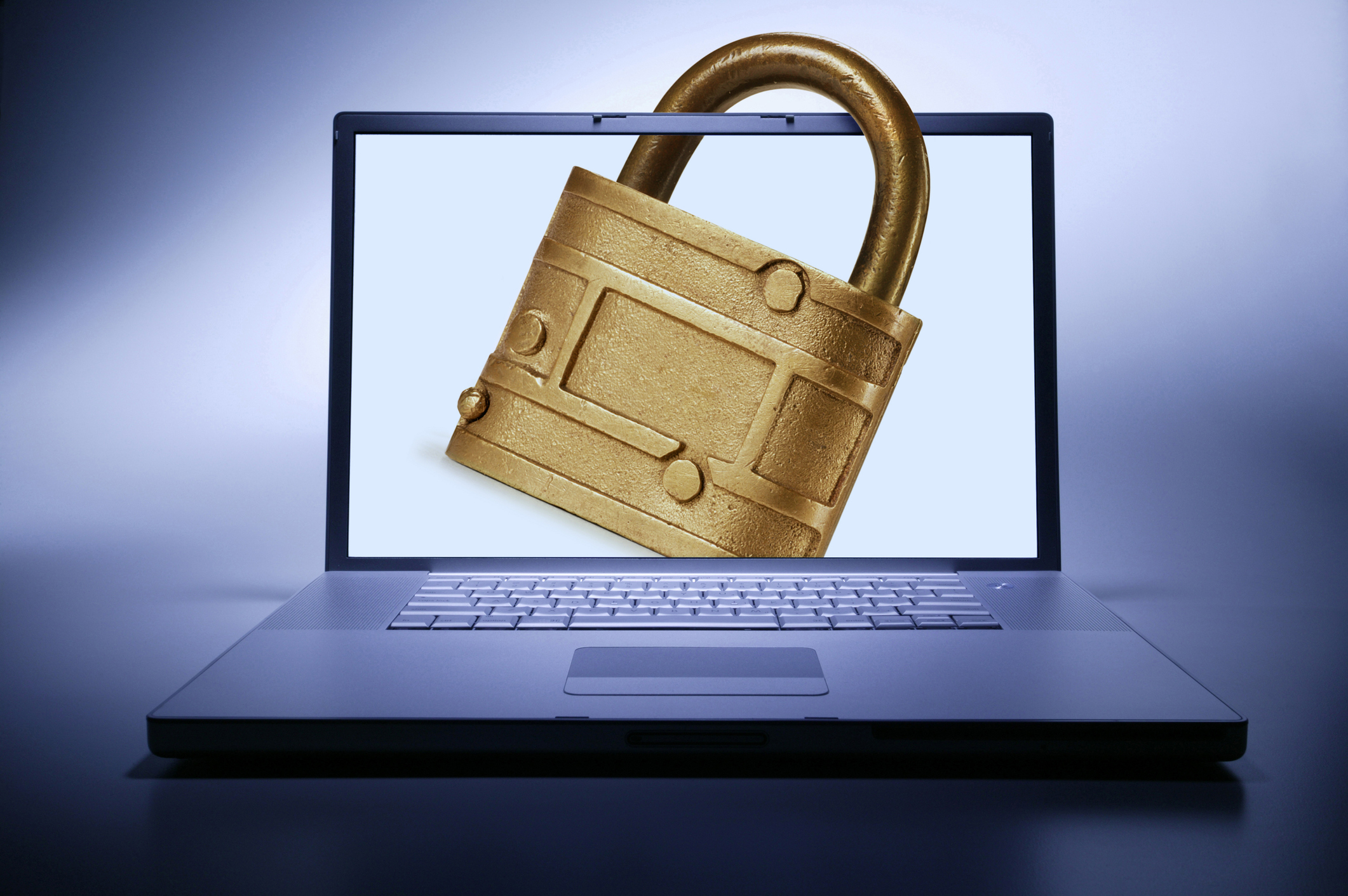 Internet Security. Open laptop with lock through screen.