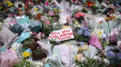 Signs and tributes calling for an end to violence against women