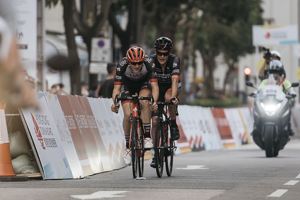 Matej Mohoric of UAE Team Emirates, and Robbie Hucker of IsoWhey Sports