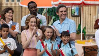 Cyril, Doctor Turner and Shelagh clapping at the Poplar Commonwealth Games