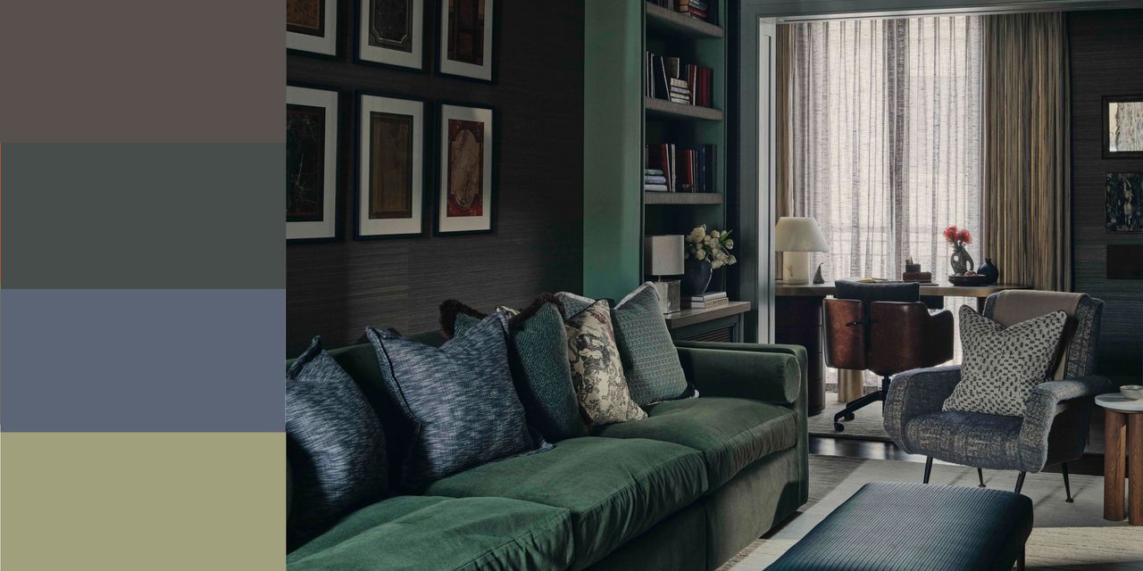winter color palette in a modern living room, color-drenched in dark green with dark green velvet sofa, dark blue cushions and ottoman, dark-colored sheer curtains, an armchair with a patterned cushion