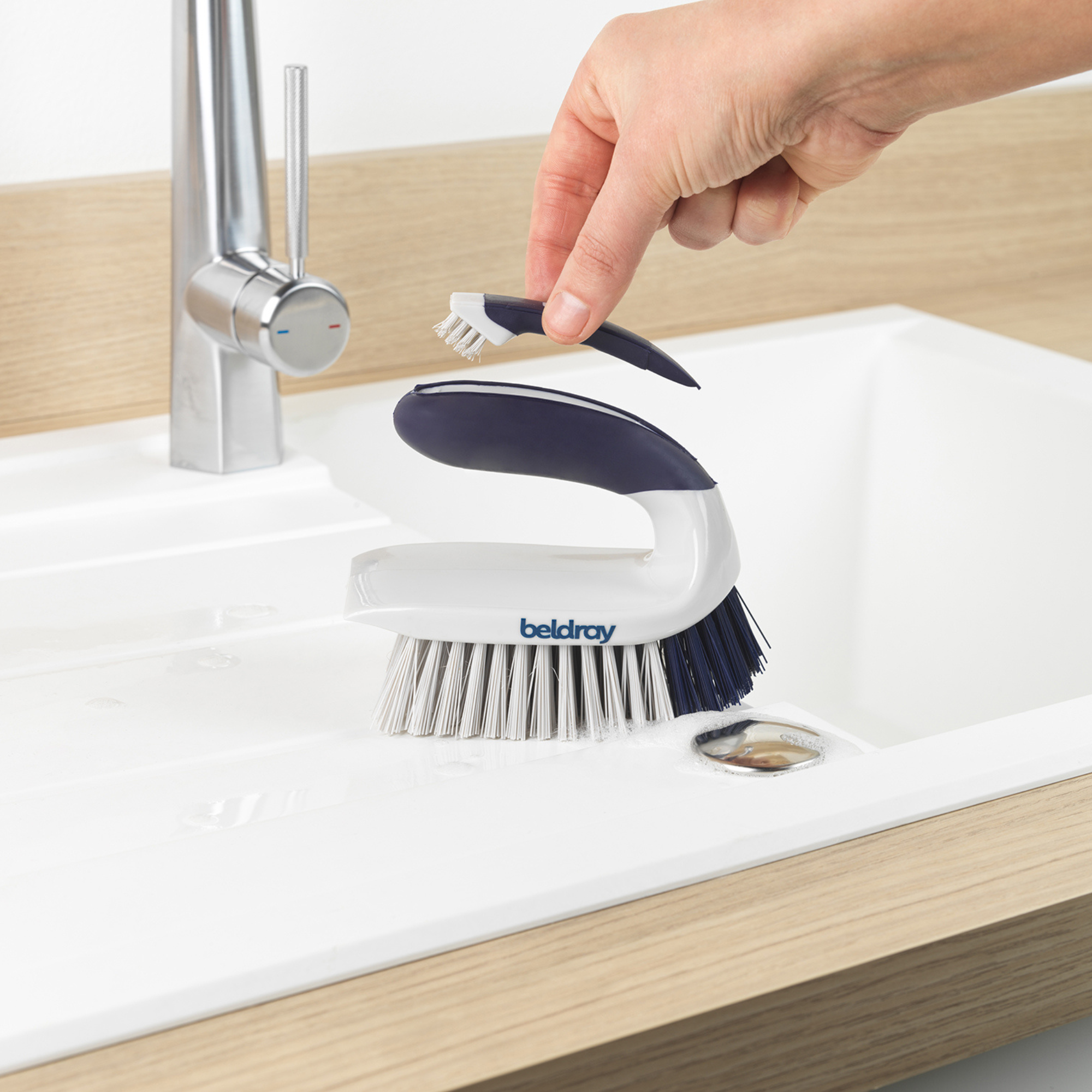 Beldray Scrape &amp;amp; Scrub Duo - Deep Clean Handheld Scrubbing Brush on a bathroom sink.