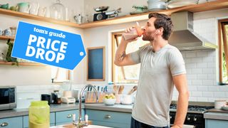 Man drinking a protein shake at home