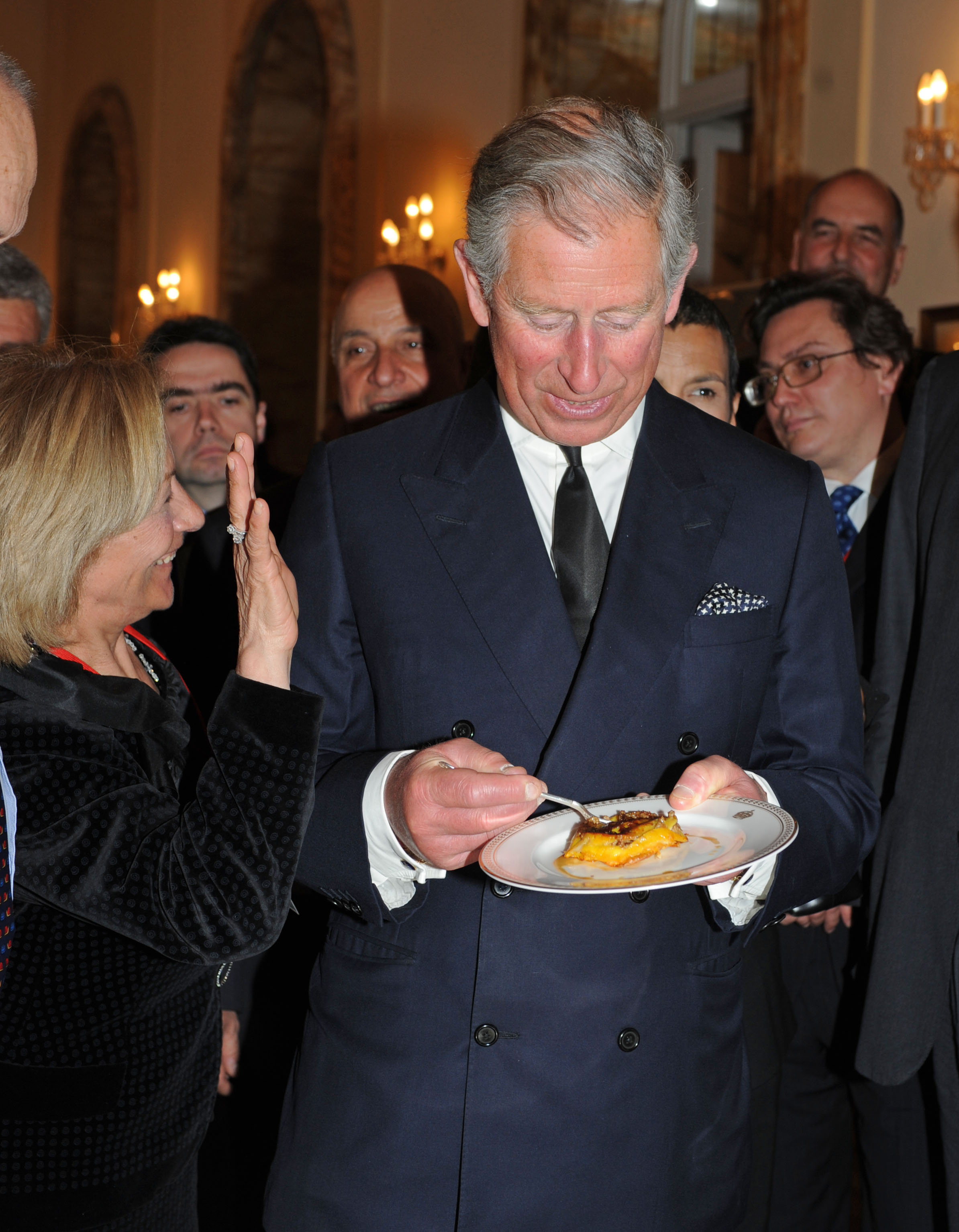 King Charles eating a cake