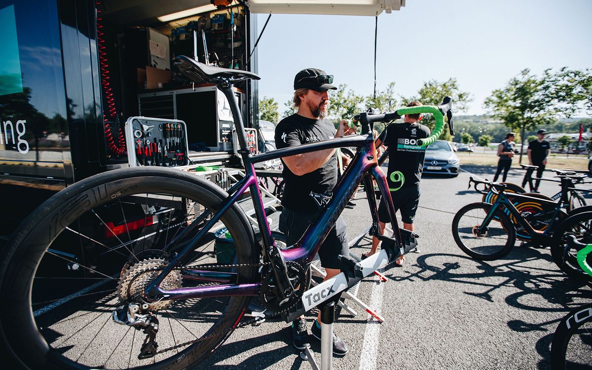 A mechanic works on Peter Sagan's Specialized Creo