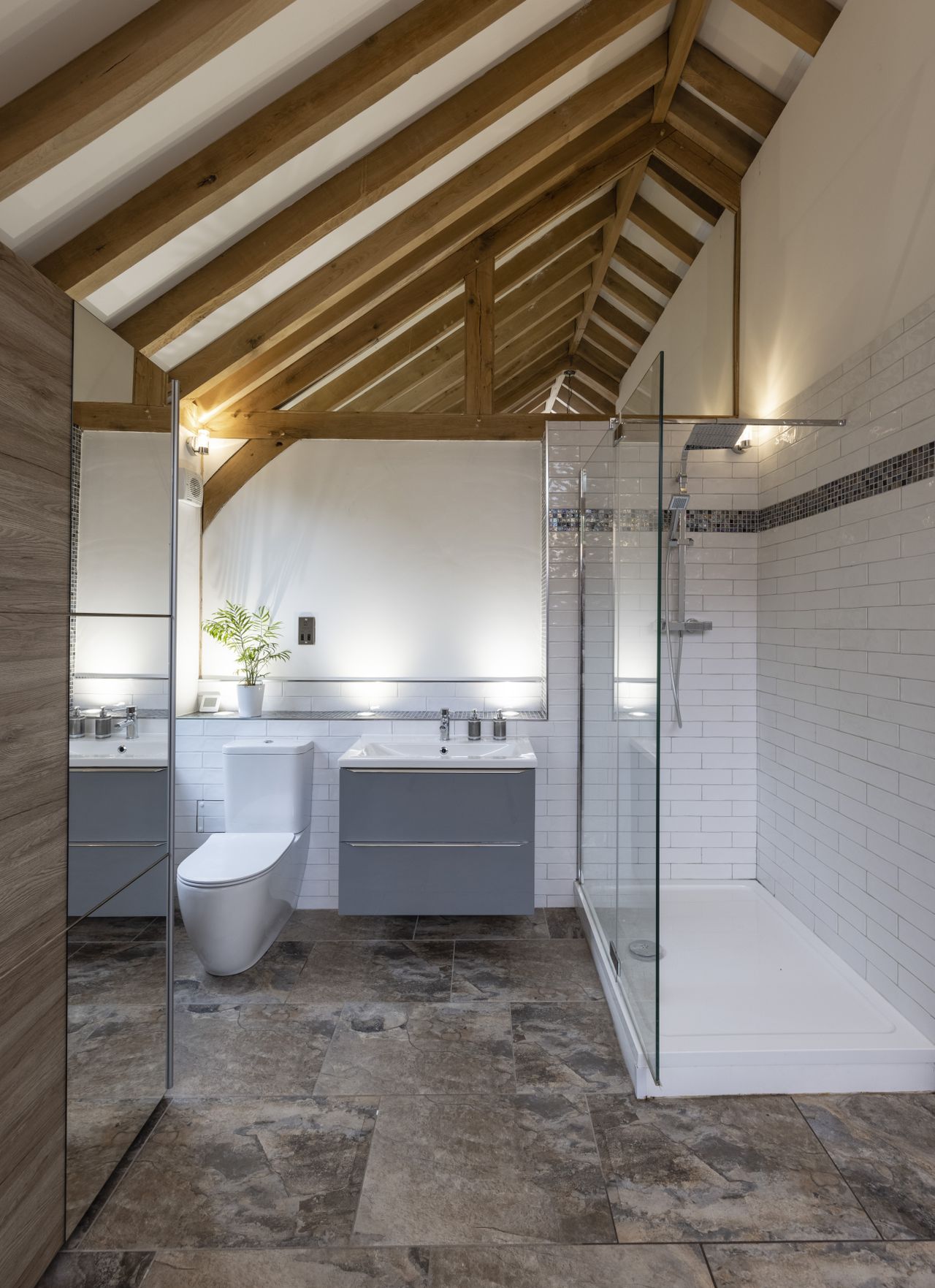 bathroom in oak frame house with large shower