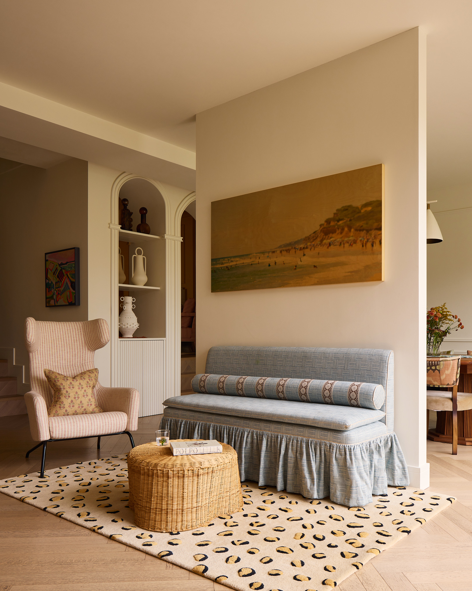 Tonal living room with soft blue and pink accents