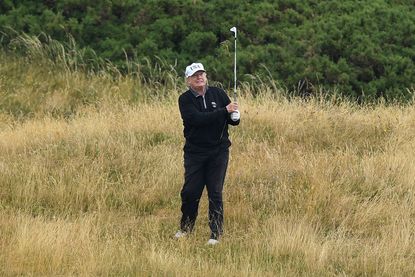 Trump golfs in Scotland
