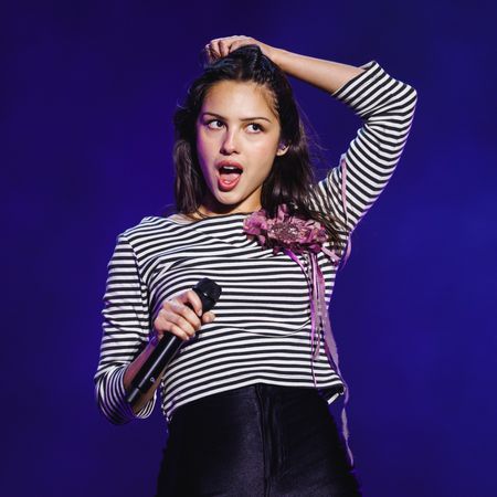 Olivia Rodrigo performs during Primavera Sound 2026 at Parc Del Forum in Barcelona, Spain on June 6, 2026 wearing black hot pants, a striped breton top, and knee-high Dr Martens boots