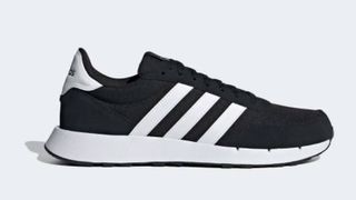 Black adidas trainers with 3 white stripes down the side and white sole