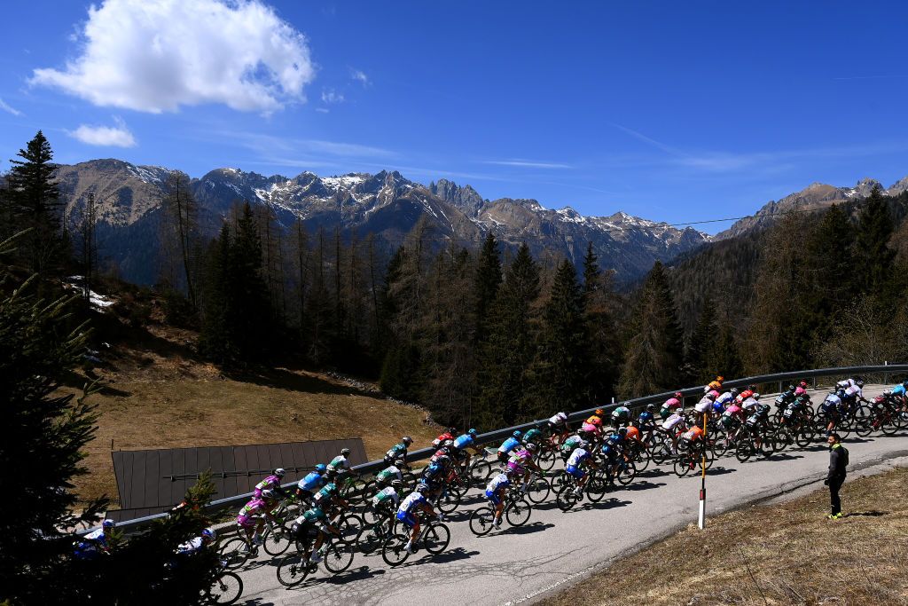 SAN MARTINO DI CASTROZZA ITALY APRIL 18 A general view of the peloton passing through a Passo Brocon 1616m landscape during the 45th Tour of the Alps 2022 Stage 1 a 1609km stage from Cles to PrimieroS Martino di Castrozza 708m TouroftheAlps on April 18 2022 in San Martino di Castrozza Italy Photo by Tim de WaeleGetty Images
