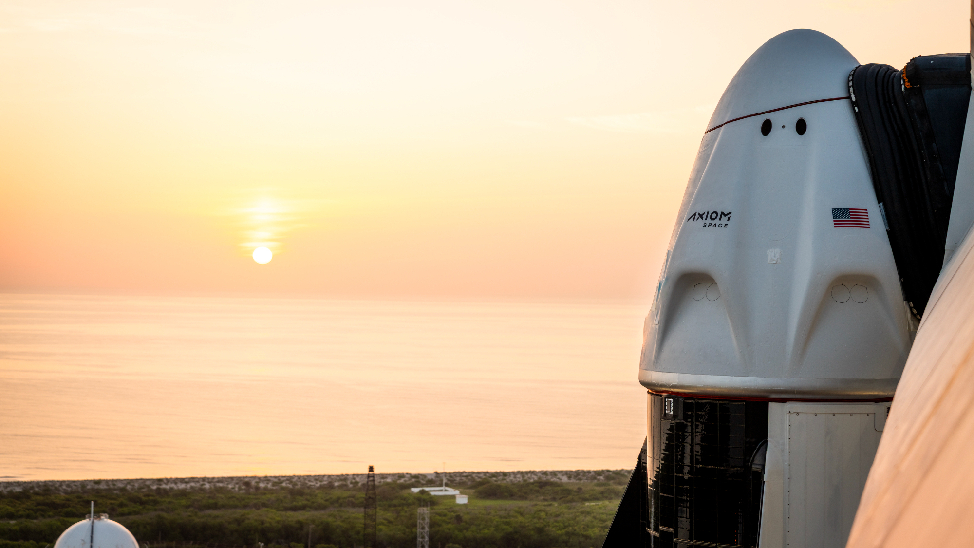 The SpaceX Falcon 9 rocket and Crew Dragon capsule that will launch the Ax-4 astronaut mission to the ISS on the pad.