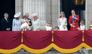 Prince William, Kate Middleton, and their families on the Buckingham Palace balcony for their wedding in 2011