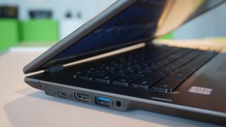 A close-up of the left hand side of the Acer Chromebook 14 for Work with the lid half-closed