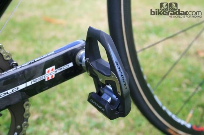 House mismatches his Italian groupset and Italian made frame with Shimano Dura-Ace pedals. There's probably a law against this