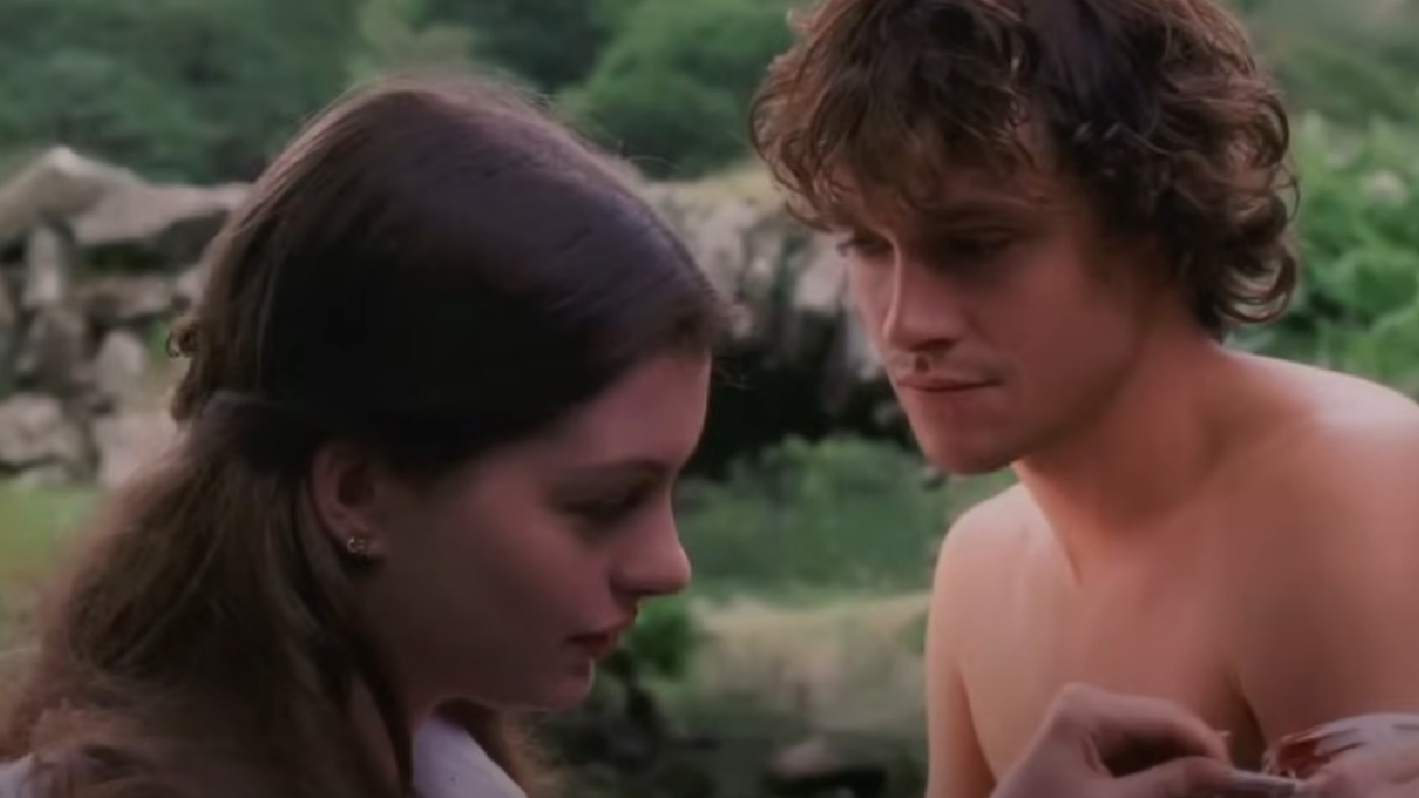 Ella treating Prince Charmont's wounds in Ella Enchanted.