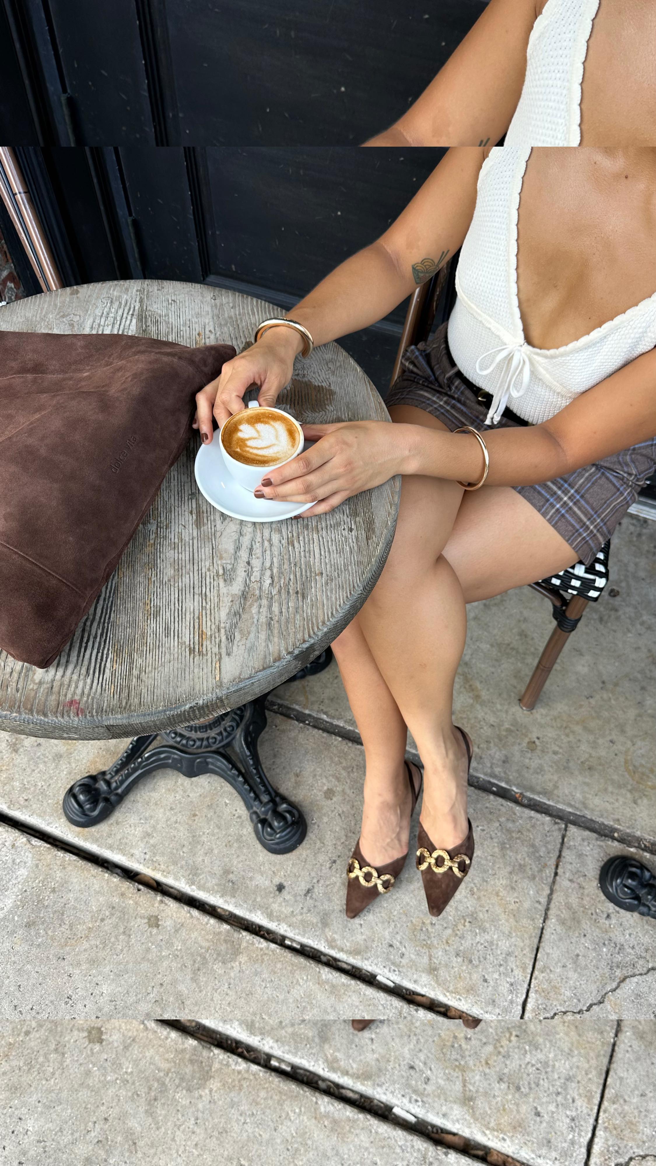 Jeannine Roxas in brown heeled slingbacks.