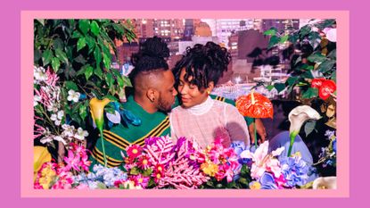 What are "superbloom" relationships? Pictured: Young couple cuddling looking happy